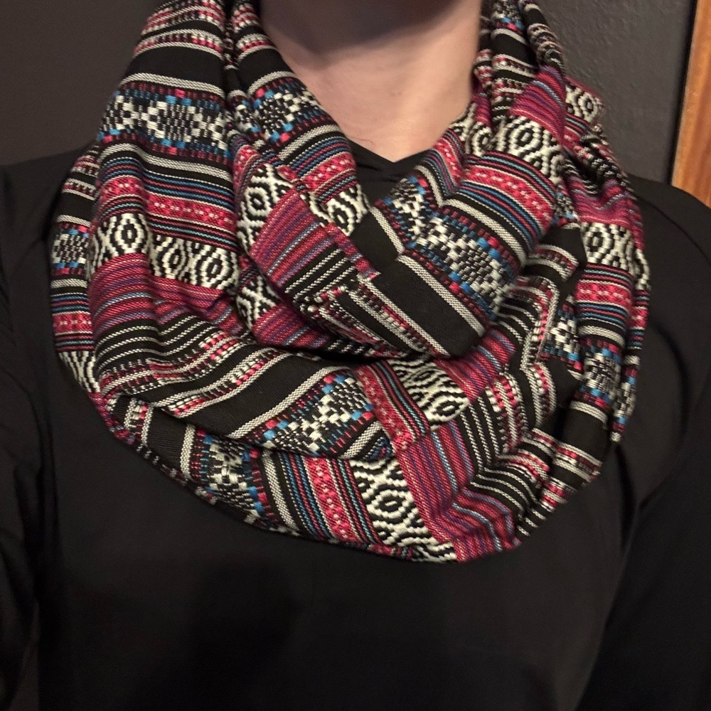 Infinity scarf made from up-cycled textiles featuring multiple colors